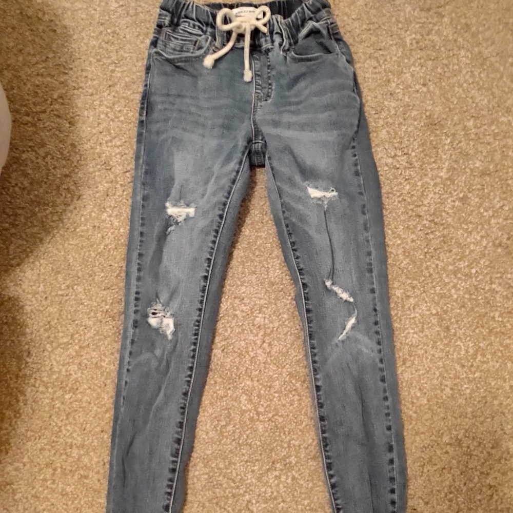 Ripped blue skinny jeans